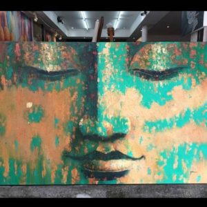 Green and Gold Buddha Face